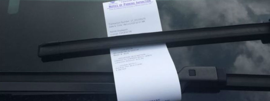 Parking Notice on Car Windshield